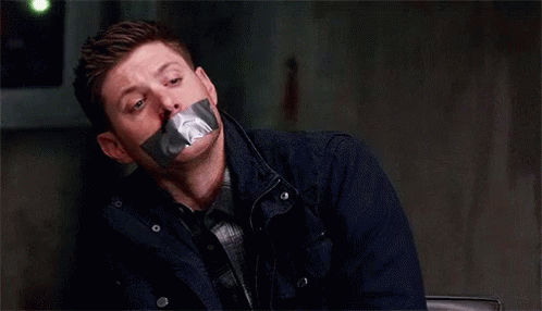 jensen-ackles-duct-taped-mouth.gif.a8a77a3a5f5eeba7064e55603e961f13.gif